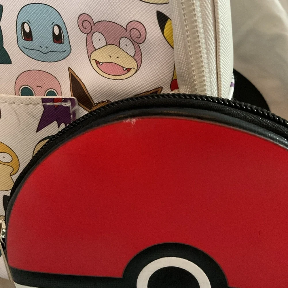 Pokemon‎ Pokeball Graphic Mini Backpack, Multi-Color  with chained zipper pouch.